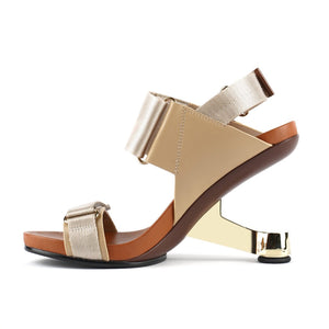 Inner view of the united nude eamz run. This toffee/nude high heel sandal has a chrome door-stopper like heel and 3 adjustable straps.