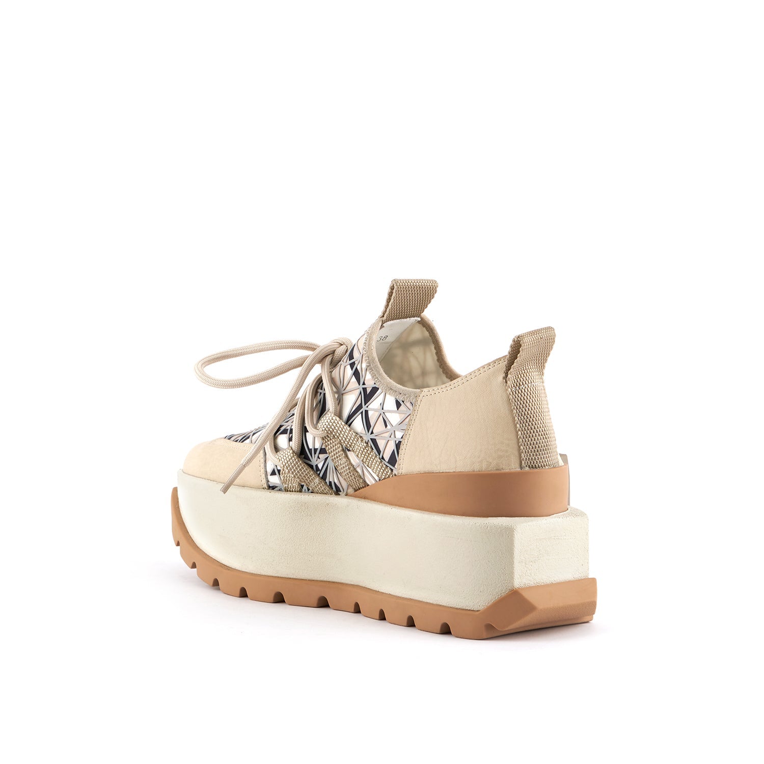 inner back side view of the united nude roko hype sneaker in the color beige/natural. This sneaker has a wedge platform sole, a lace up front, and a black and white geometric design.