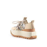 Load image into Gallery viewer, inner back side view of the united nude roko hype sneaker in the color beige/natural. This sneaker has a wedge platform sole, a lace up front, and a black and white geometric design.
