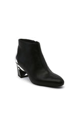 Load image into Gallery viewer, Outer front side view of the black united nude twist flow bootie. This bootie has an almond toe and a silver stripe that runs from the back of the heel to the outer side of the heel
