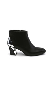 Outer side view of the black united nude twist flow bootie. This bootie has an almond toe and a silver stripe that runs from the back of the heel to the outer side of the heel