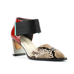 Load image into Gallery viewer, Outer front view of the united nude vita dorsey mid viper. This sandal has a pointed toe in snake skin and a red patent leather covered with a wide nylon adjustable strap around the front of the ankle. This sandal has a mid-heel with a gold and silver accent.
