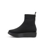 Load image into Gallery viewer, Inner side view of the united nude wa bootie lo. This bootie is black and minimal. It has a sock-like appearance with a black platform sole.
