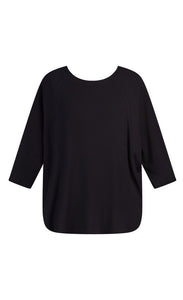 Front view of the alembika ribbed jersey top. This top has elbow length dolman sleeves, a rounded hem, and a round neck.