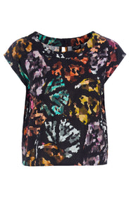 Front view of the bitte kai rand mosaic t-shirt. This short-sleeve top is black with a multicolored mosaic-like print on it. 