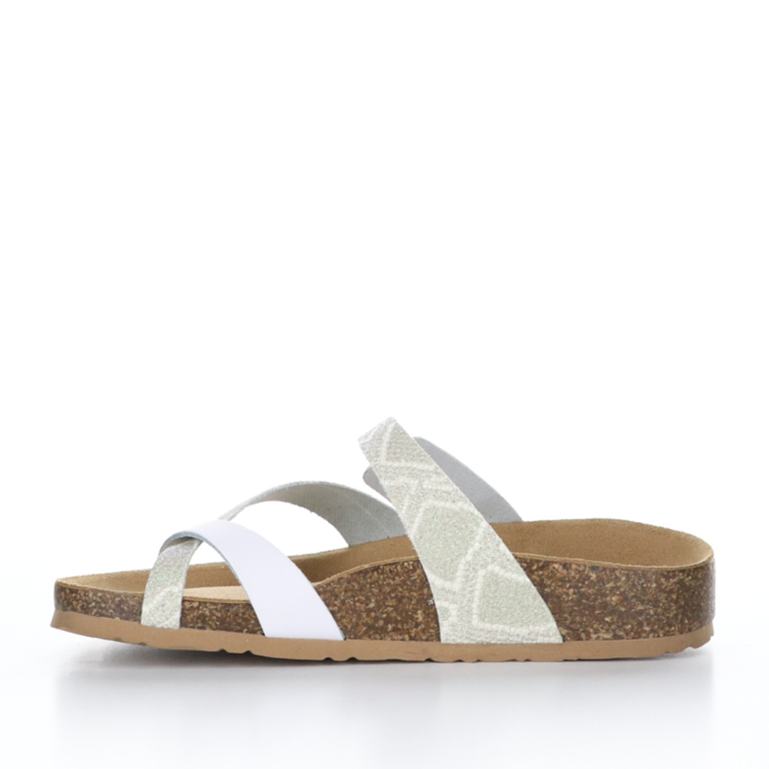 Inner view of the bos & co parr sandal. This sandal has a strap across the instep and a strap that creates a toe loop. The straps are a mix of solid white and white glitter snake print.