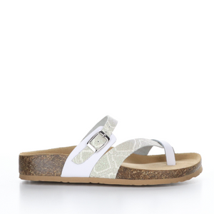 Outer view of the bos & co parr sandal. This sandal has a strap across the instep and a strap that creates a toe loop. The straps are a mix of solid white and white glitter snake print.